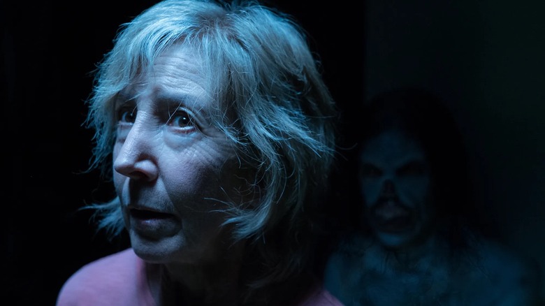 Elise Rainer being stalked by something creepy in "Insidious: The Last Key" (2018)