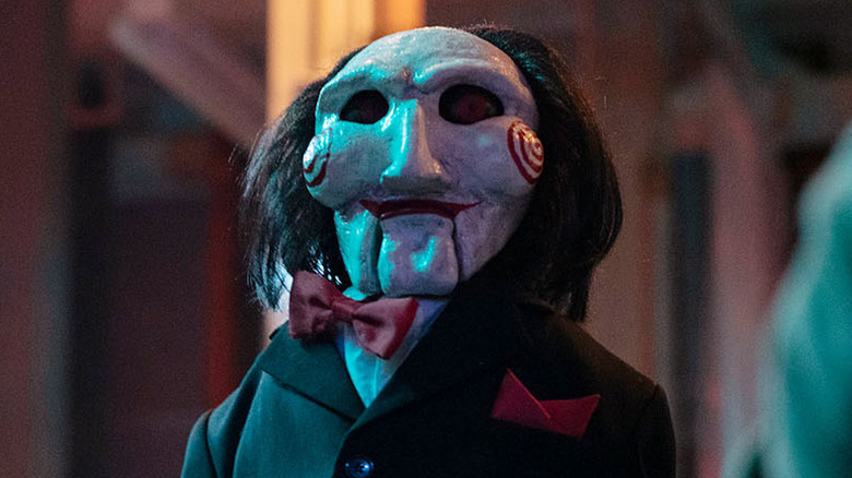 Billy the Puppet torments his captives in "Saw X" (2023)