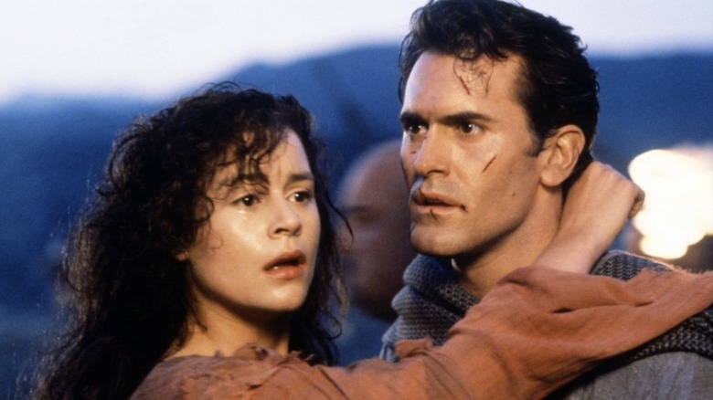 Ash Williams and Sheila in a confused clinch in "Army of Darkness"
