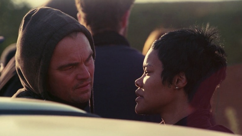 Pat Calhoun and Perfidia Beverly Hills talking sternly in One Battle After Another