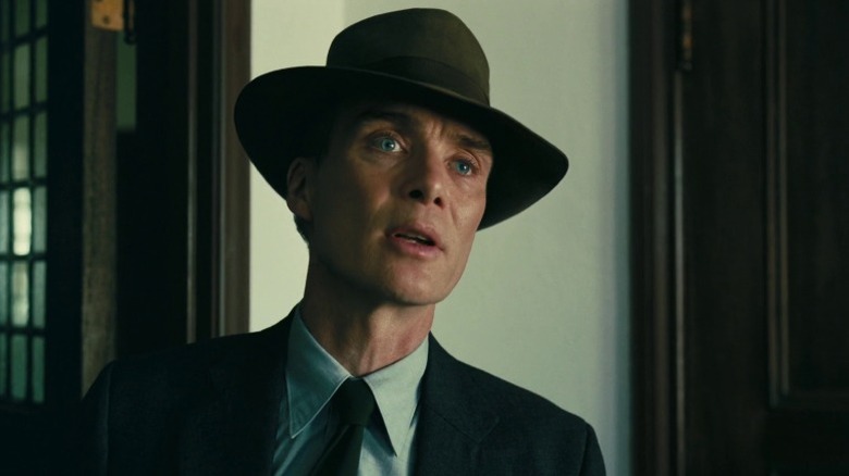 J. Robert Oppenheimer with an alarmed expression in Oppenheimer