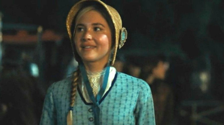 Isabel May looking around her with excitement