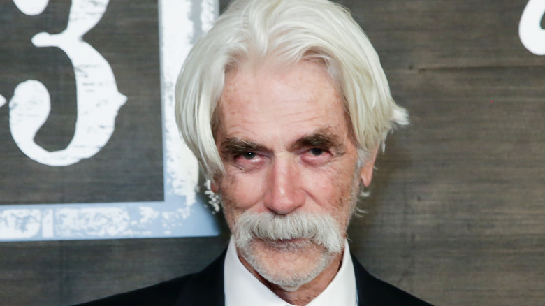 Sam Elliott posing at the 1883 premiere