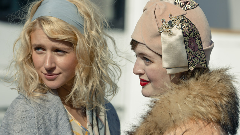 Alexandra and Jennifer wearing coats