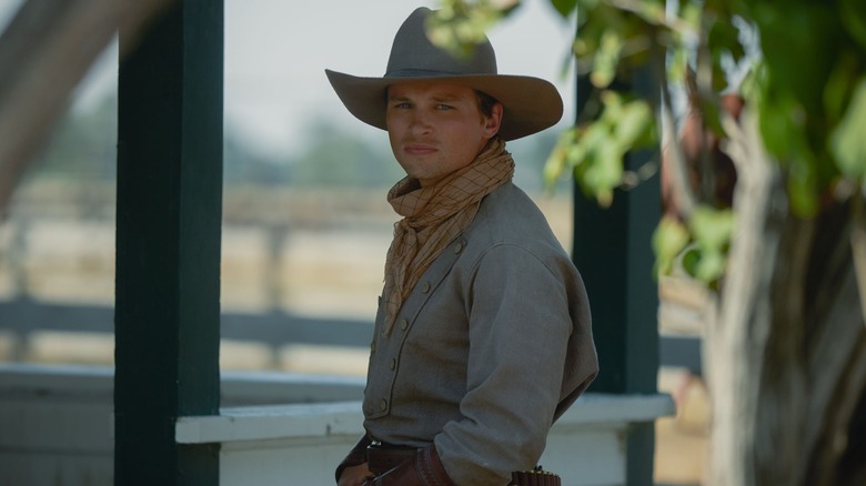 Jack Dutton in front of porch