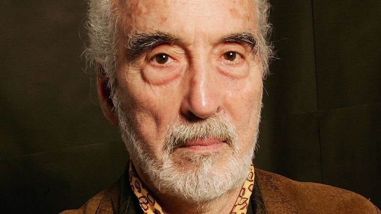 Christopher Lee stares into camera