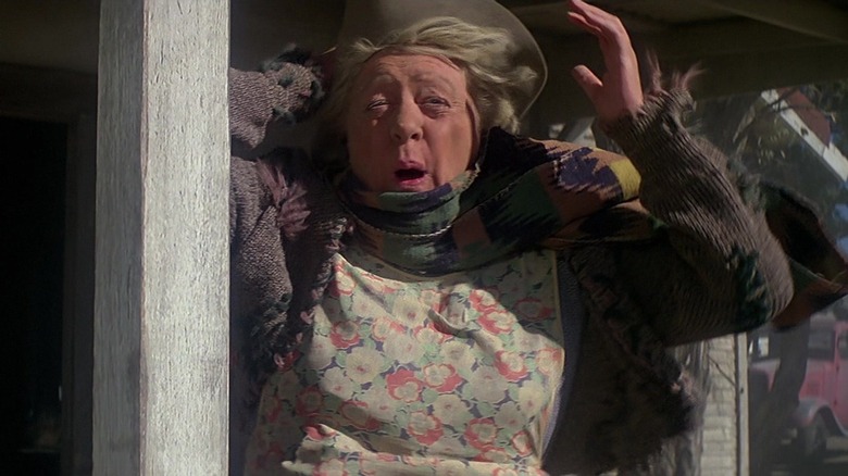 Lucille Benson raises arms