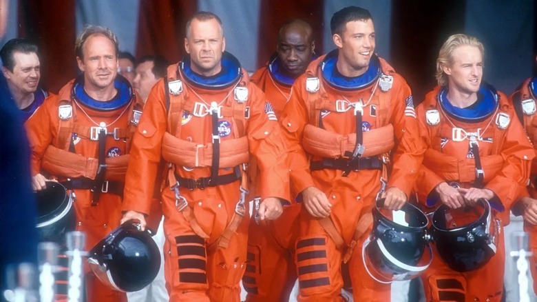 Harry Stamper and his drillers wearing astronaut suits in in Armageddon