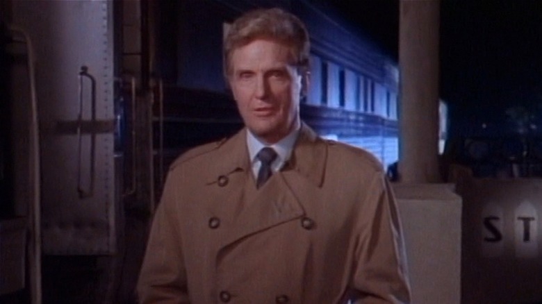 Robert Stack talking to camera in introduction