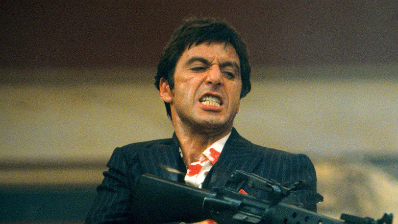 Tony Montanashooting a gun