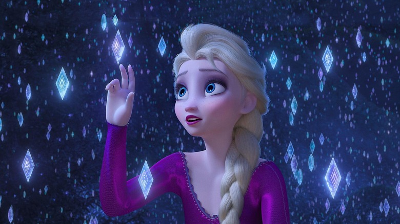 Elsa looking at ice crystals in "Frozen II" (2019)