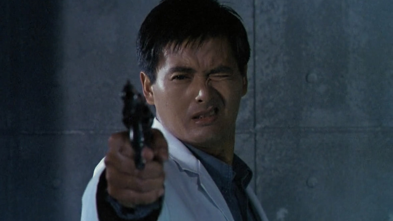 Chow Yun-fat holding gun