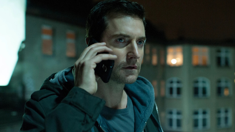 Richard Armitage speaks on the phone