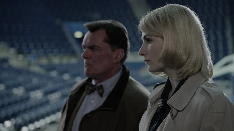 Jodie Whittaker and Stuart Milligan look left