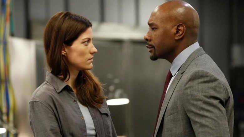 Keaton looks at Shepherd