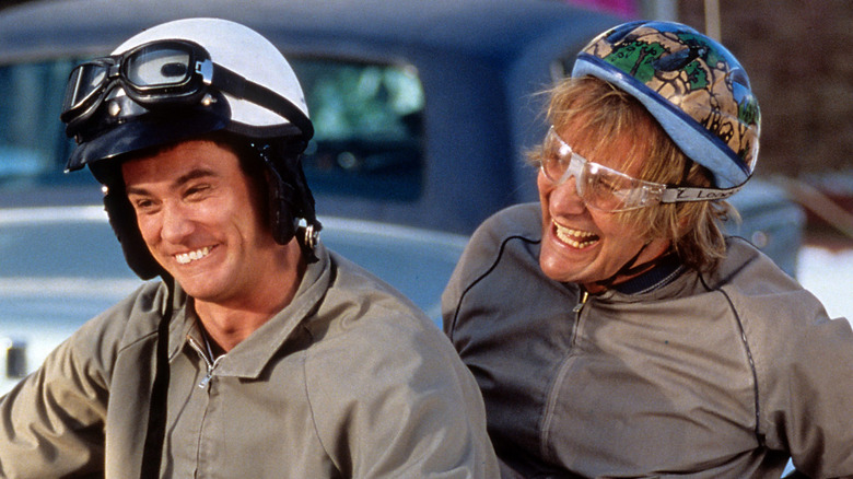 Lloyd and Harry ride a bike together in 