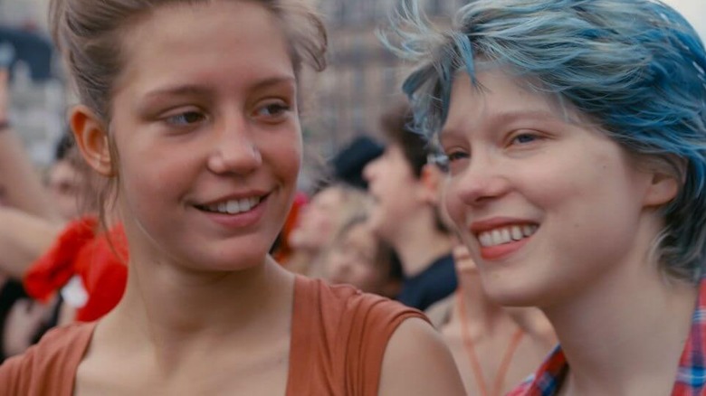 Adèle looks at a smiling Emma in "Blue Is the Warmest Color"
