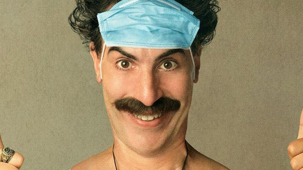 Borat 2 mask on face thumbs up