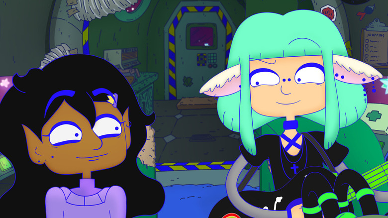 Saira makes eye contact with Willow, playing guitar, in 