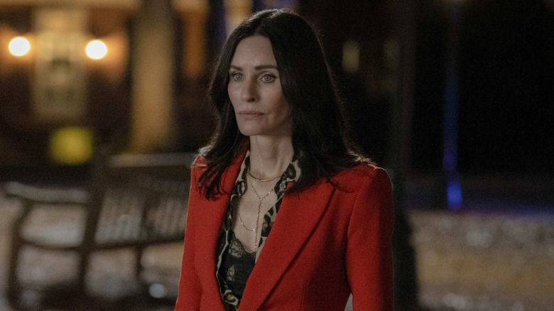 Gale Weathers standing outside in red blazer (2026)