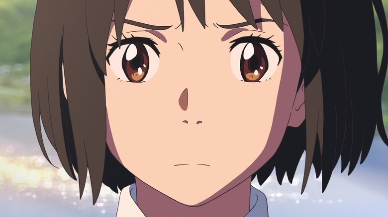 Mitsuha staring seriously ahead