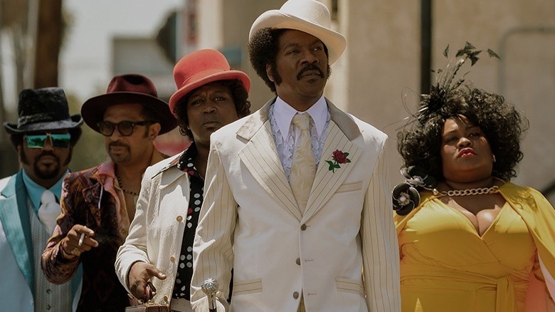 Dolemite leads friends down the street