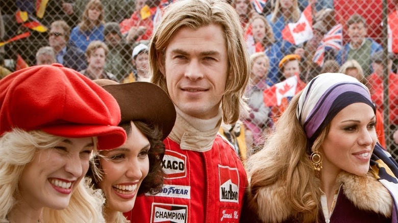 Hunt poses with women
