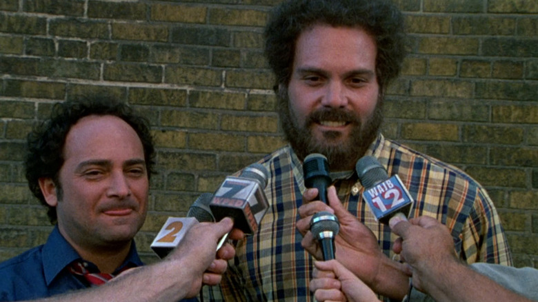 Abbie Hoffman speaks to reporters