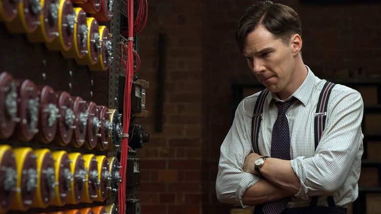 Turing examines his computer