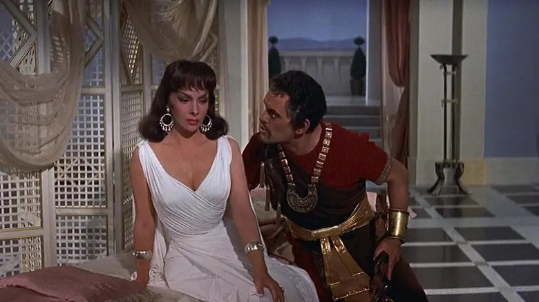 Gina Lollobrigida sits