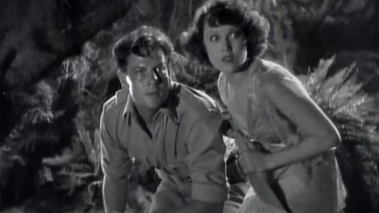 Joel McCrea and Fay Wray looking afraid