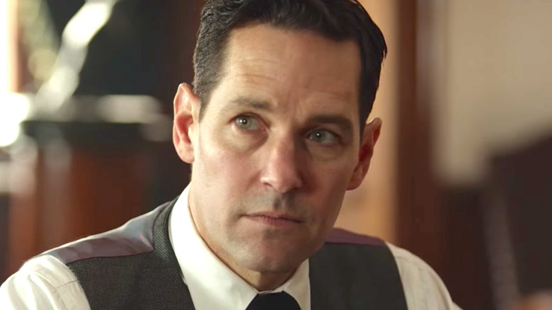 Paul Rudd looks left