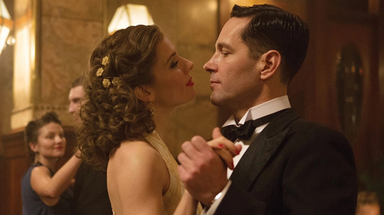 Berg dances with a woman