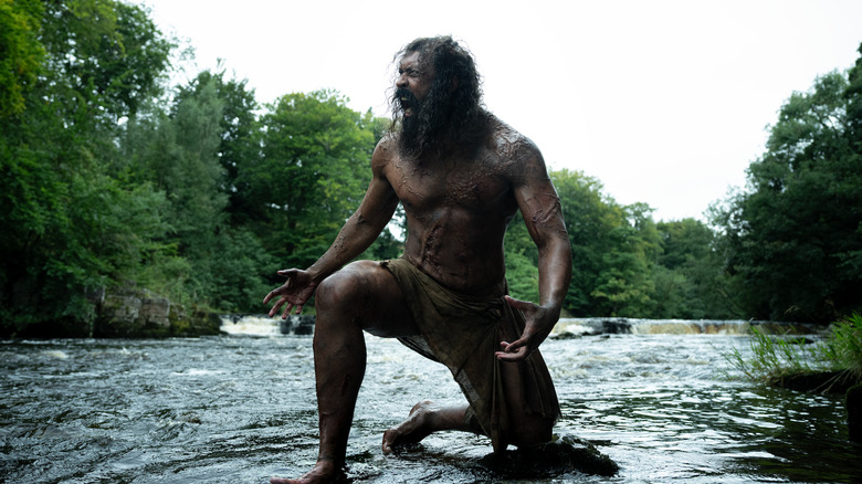 Samson kneeling in creek yelling in "28 Years Later: The Bone Temple"
