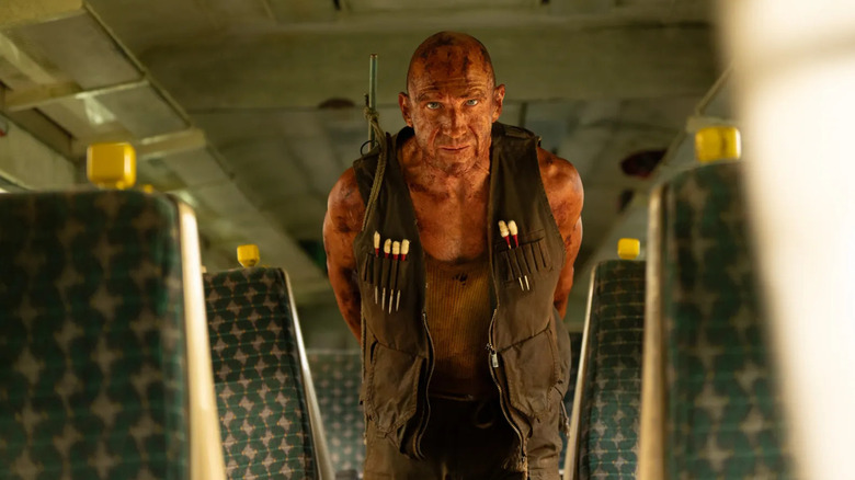 Dr. Kelson standing in a train car in "28 Years Later: The Bone Temple"