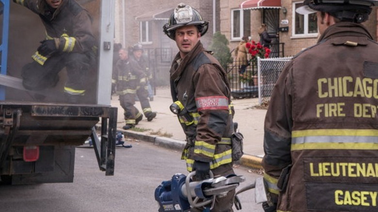 A team of firefighters stand in a hospital Chicago Fire