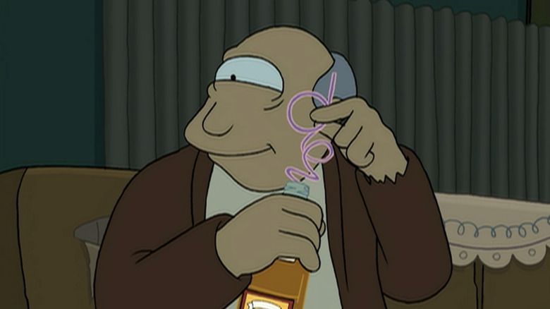 Morris drinking liquor through straw