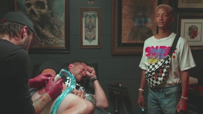 Sal getting tattooed
