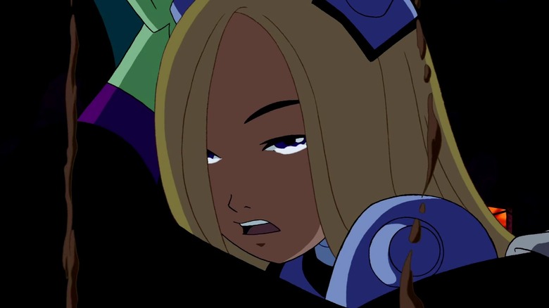 Terra crying on Beast Boy's shoulder