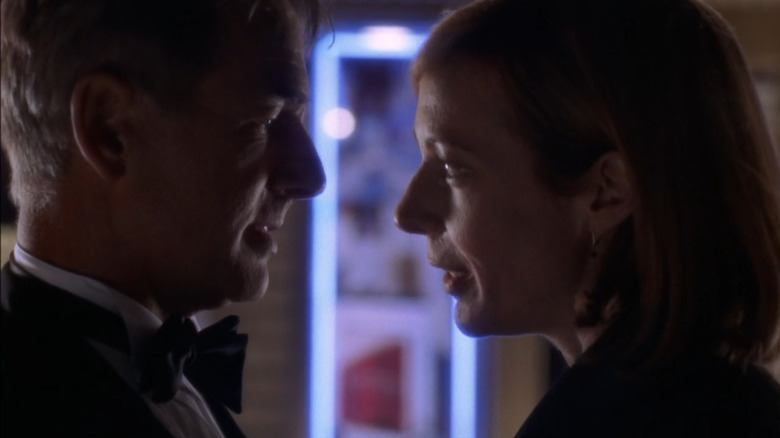 Donovan and C.J. standing close to one another