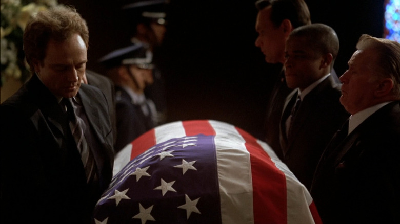Josh, Bartlet, Charlie, and Santos carrying Leo's coffin