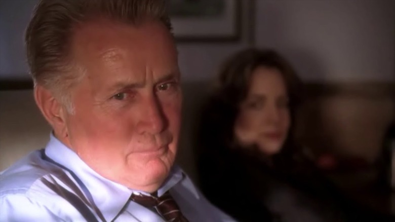 Bartlet looking out plane window next to Abbey