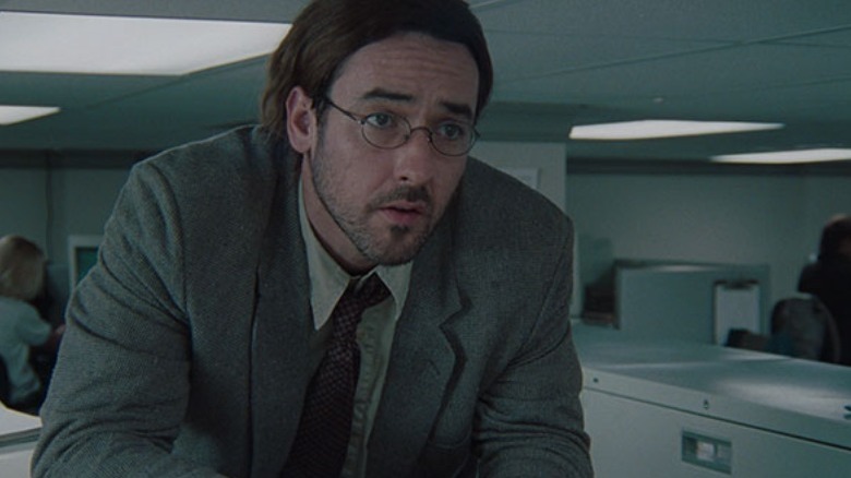 John Cusack as Craig Schwartz in Being John Malkovich