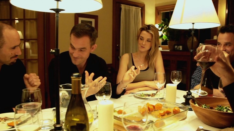 Friends enjoy a dinner party