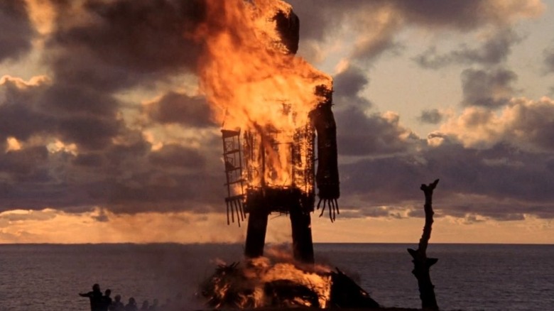 Everyone dances while The Wicker Man burns