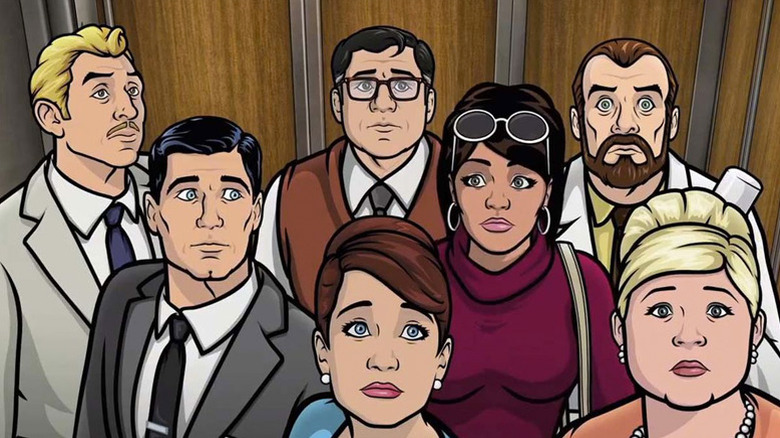 Archer and his co-workers in the elevator