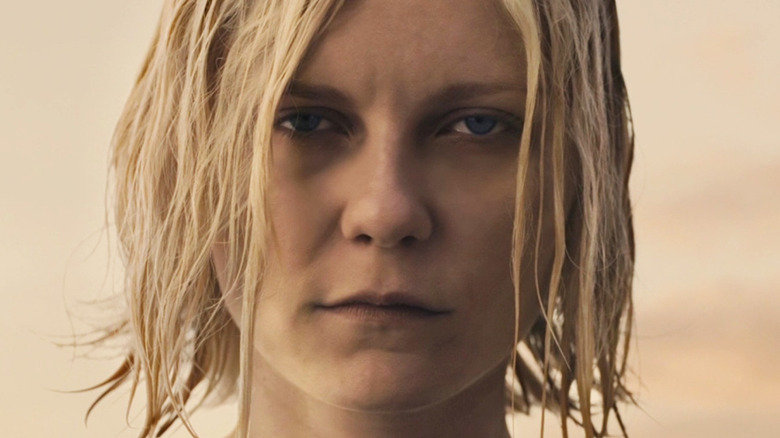 Kirsten Dunst staring blankly ahead