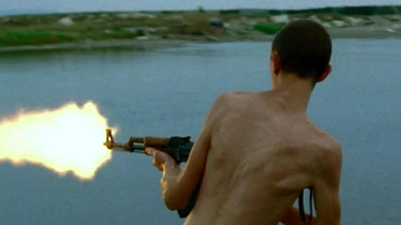 Ciro Petrone firing machine gun