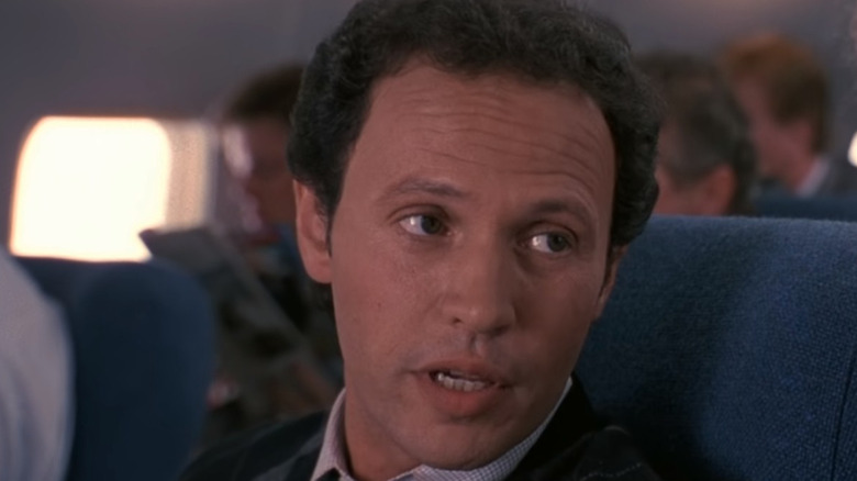Billy Crystal on airplane