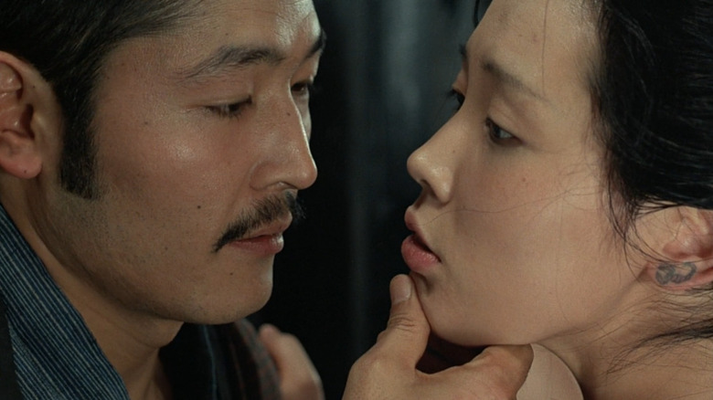 Kicizo and Sada in passionate embrace
